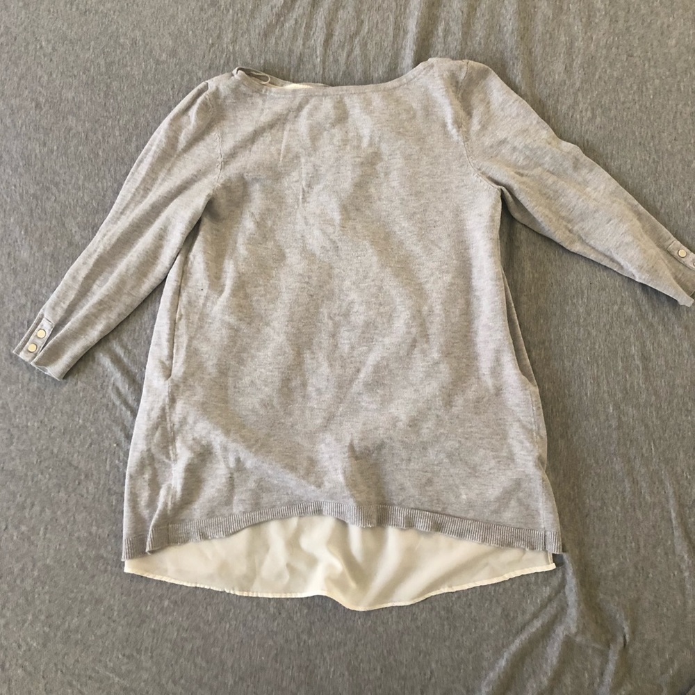Shirt with a cut on the back.